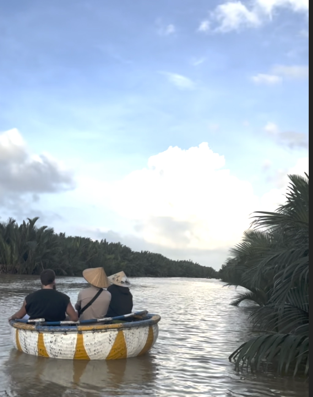 floating through the coconut forest in Hoi An in a basket boat